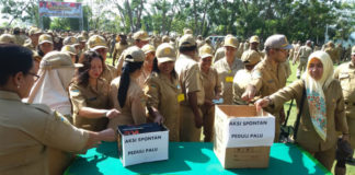 Caption : ASN Kota Jayapura berpartisipasi dalam aksi spontan peduli Palu