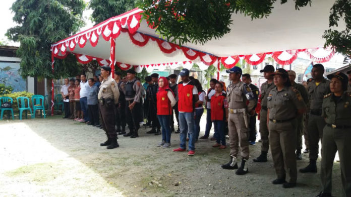 Caption : Persiapan Operasi Non Yustisi yang dilaksanakan di Kelurahan Vim, Distrik Abepura Caption : Persiapan Operasi Non Yustisi yang dilaksanakan di Kelurahan Vim, Distrik Abepura