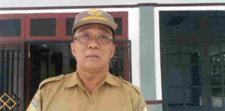 Caption : Kepala Dinas Perindustrian, Perdagangan dan Koperasi Kabupaten Keerom Drs. Marthen Simbong