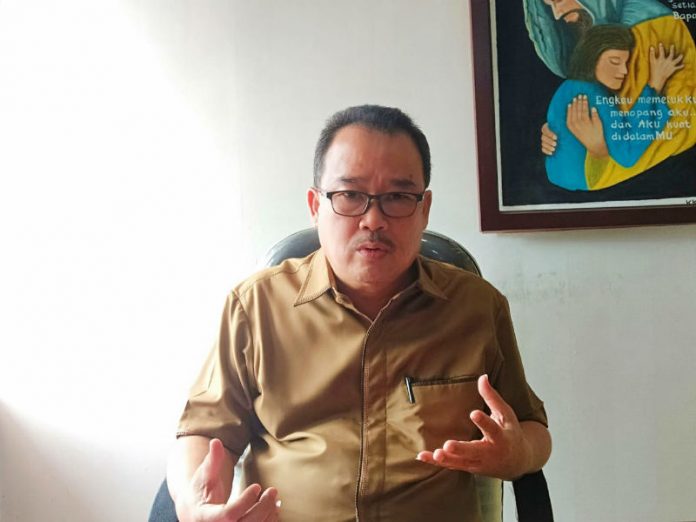 Wakil Ketua Komisi I DPR Papua, Tan Wie Long