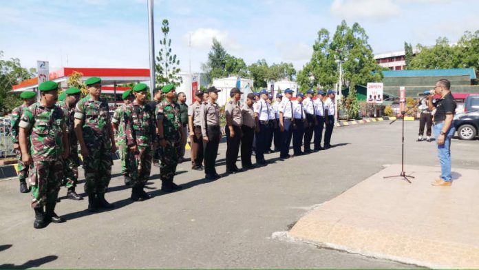 Caption : Suasana apel siaga pemilu yang digelar Pertamina bersama TNI/Polri secara serentak di seluruh pertamina