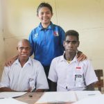 Caption : Diana Cristiana Da Costa Ati, S.pd, ketika foto bersama dengan dua Murid kelas VI  SD Inpres Kaibusene Distrik Haju, Kabupaten Mappi, Provinsi Papua.
