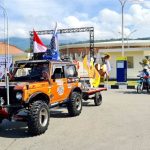 Salah satu peserta touring saat bersiap di depan Stadion Utama Lukas Enembe, Kampung Harapan, Distrik Sentani Timur, Kabupaten Jayapura, Sabtu (11/9/2021)