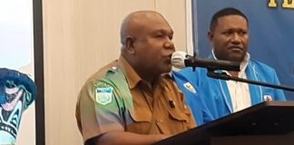 DR. Timotius Demetouw,SE,M.Si
