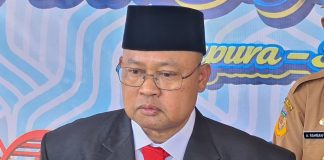Dr. Entis Sutisna, S.E, MM, CGRM